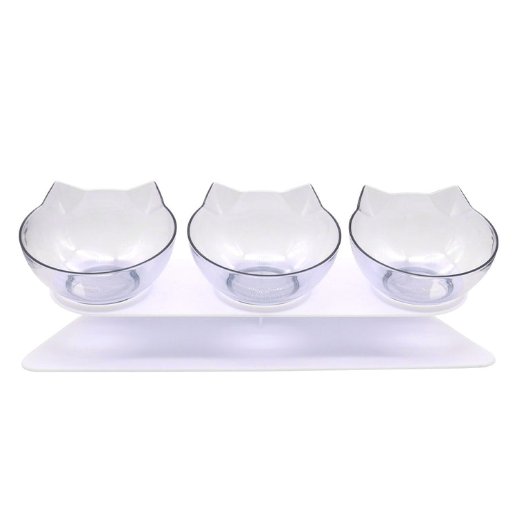 LUXENEST HOME Kitten Cervical Support Feeding Bowl with two bowls filled with pet food on a green background.