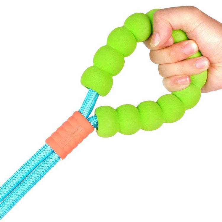 LUXENEST HOME Foam Handle Pet Traction Leash in use with a woman and her dog, showcasing colorful handle and leash design.