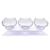 LUXENEST HOME Kitten Cervical Support Feeding Bowl with two bowls filled with pet food on a green background.