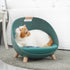 LUXENEST HOME Four Seasons Cat Nest Pet Bed with a cat relaxing comfortably in a modern pet bed.