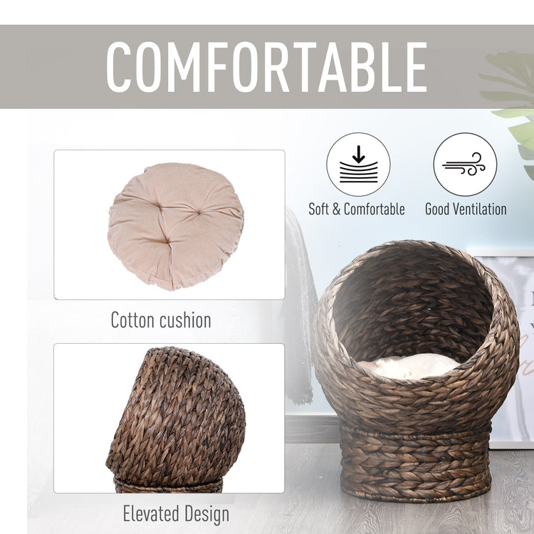 LUXENEST HOME Handwoven Wicker Cat Egg Chair with a soft cushion and a white cat lounging inside.