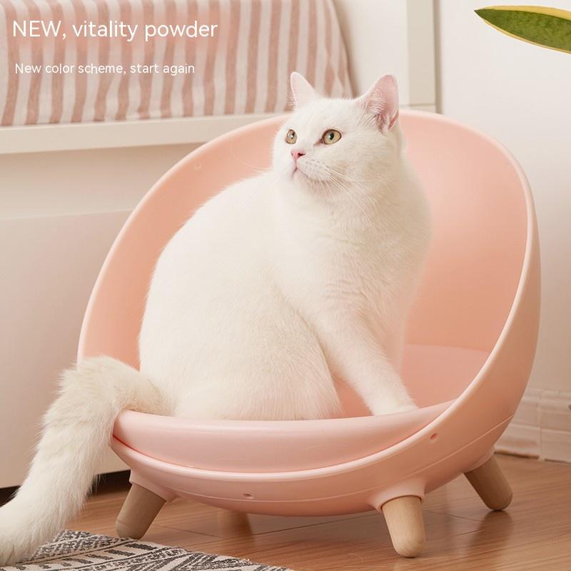 LUXENEST HOME Four Seasons Cat Nest Pet Bed with a cat relaxing comfortably in a modern pet bed.