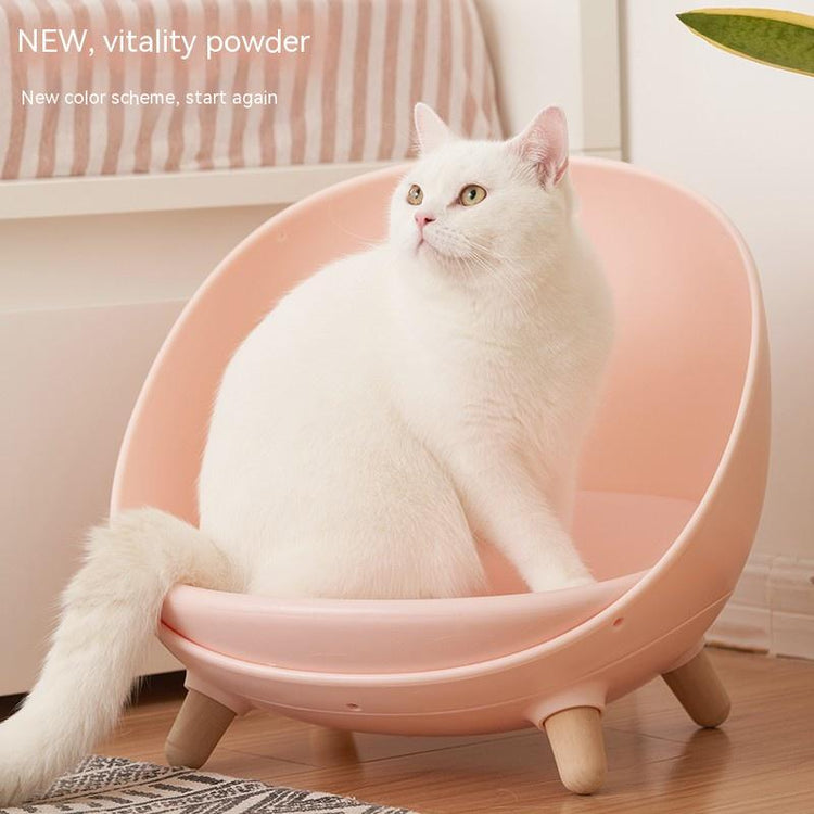 LUXENEST HOME Four Seasons Cat Nest Pet Bed with a cat relaxing comfortably in a modern pet bed.