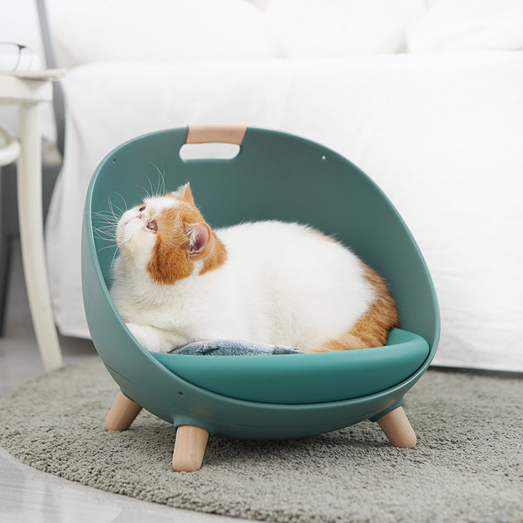 LUXENEST HOME Four Seasons Cat Nest Pet Bed with a cat relaxing comfortably in a modern pet bed.