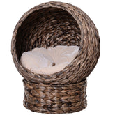 LUXENEST HOME Handwoven Wicker Cat Egg Chair with a soft cushion and a white cat lounging inside.