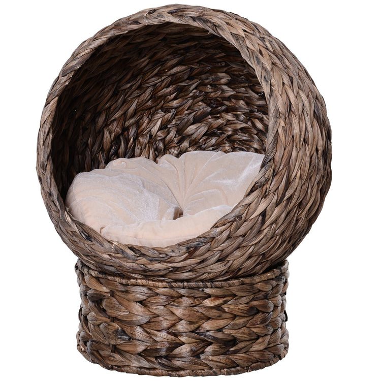 LUXENEST HOME Handwoven Wicker Cat Egg Chair with a soft cushion and a white cat lounging inside.