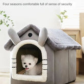 LUXENEST HOME Warm Washable Pet House Bed with a small dog in a cozy, enclosed design for comfort and security.