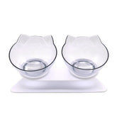 LUXENEST HOME Kitten Cervical Support Feeding Bowl with two bowls filled with pet food on a green background.