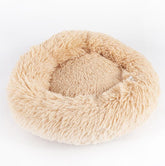 LUXENEST HOME Round Plush Dog & Cat Bed Nest with a cat lounging comfortably in a soft, cozy bed.