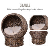 LUXENEST HOME Handwoven Wicker Cat Egg Chair with a soft cushion and a white cat lounging inside.